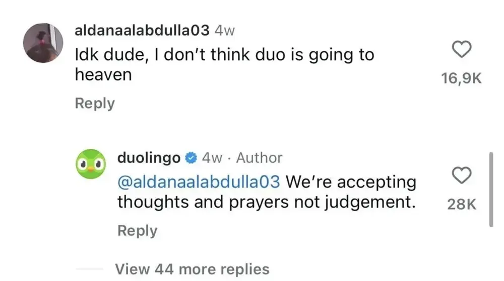 A user comments about Duo not going to heaven; Duolingo replies saying they accept thoughts and prayers, not judgement.