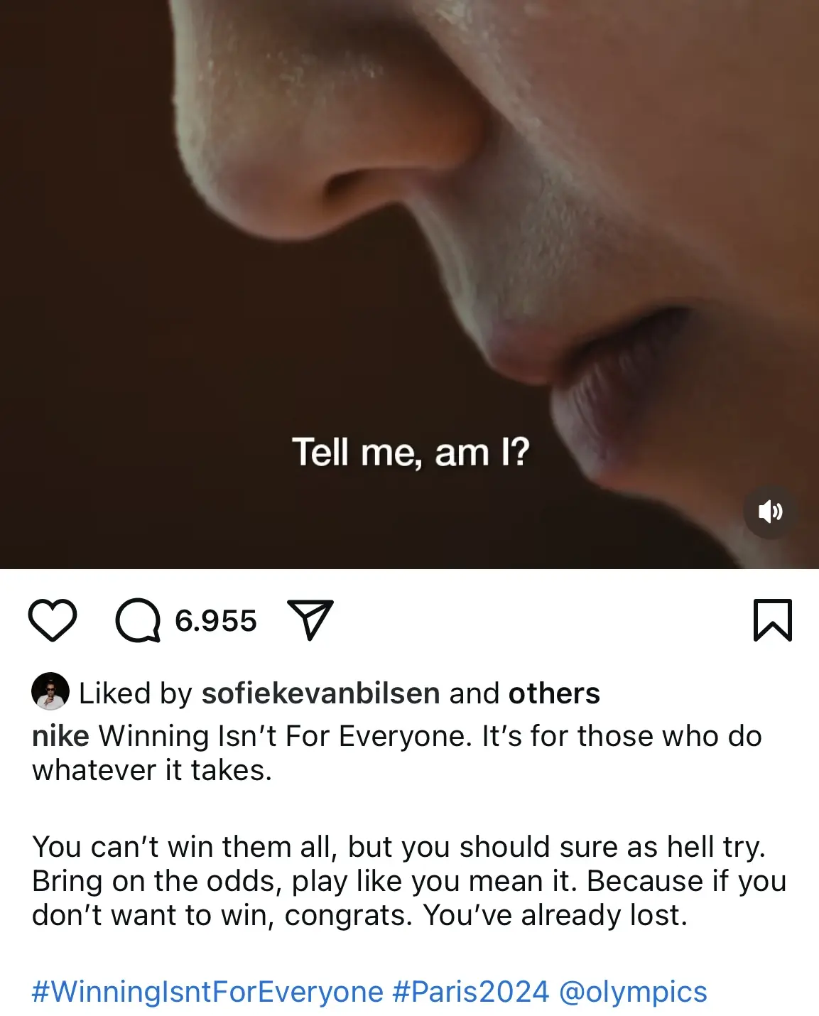 Close-up of a persons face with the caption Tell me, am I? in white text, featured in a Nike Instagram post.